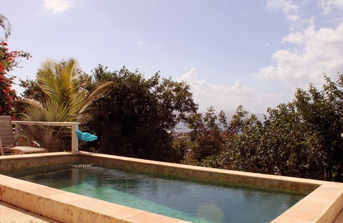 Estate Pastory Villa | Deluxe Pool Home with air conditioned bedrooms and stunning panoramic views!