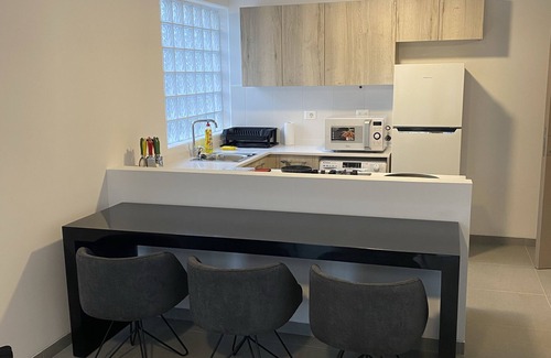 Sodeco Apartment | Delightful Stay in Vibrant Monot with Kitchen & Breakfast