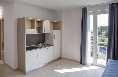 Pieve Vecchia Apartment | Elegant Suite with Shared Pool & Private Balcony Oasis