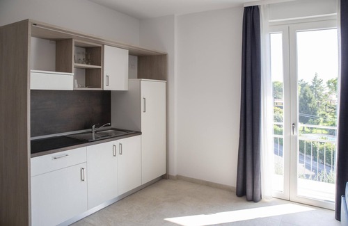 Pieve Vecchia Apartment | Elegant Suite with Shared Pool & Private Balcony Oasis