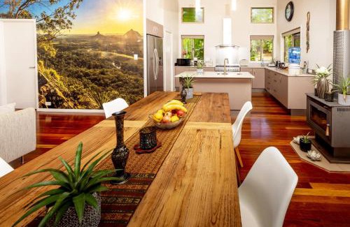 Doonan House | Elegant Suite with Fireplace & Pond in Noosa Hinterland