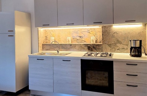 Magugnago Apartment | Relax at Delvai by Interhome: Oceanfront Oasis with Pool