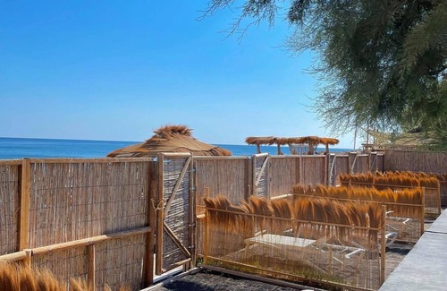 Perivolos Apartment | Explore Demilmar Suites: Oceanfront Bliss in Santorini