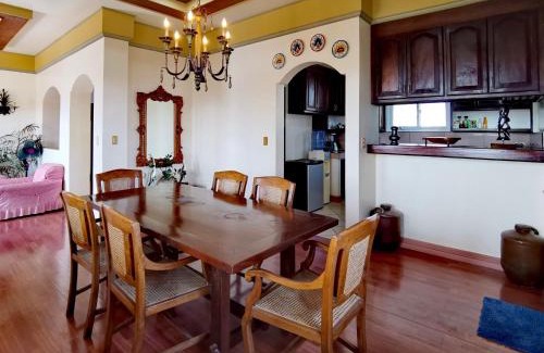 Basco House | Cozy Den Den Guesthouse: Family-Friendly with Kitchen Access