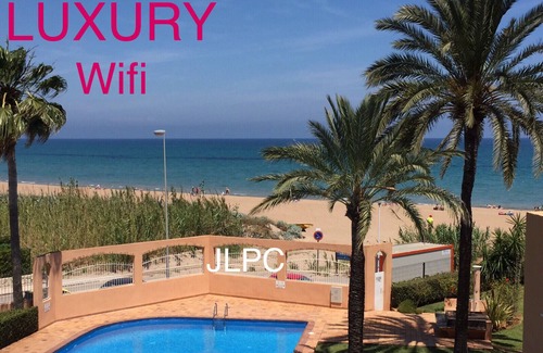 Denia Apartment | Beachfront Denia Apartment with Pool and Ocean Views