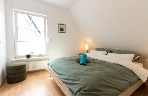 Ibbenbueren Apartment | Historic Half-Timbered House with Garage in City Center