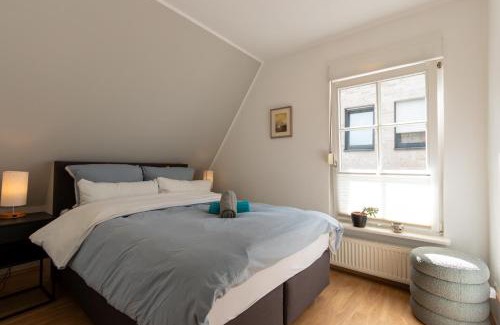 Ibbenbueren Apartment | Historic Half-Timbered House with Garage in City Center