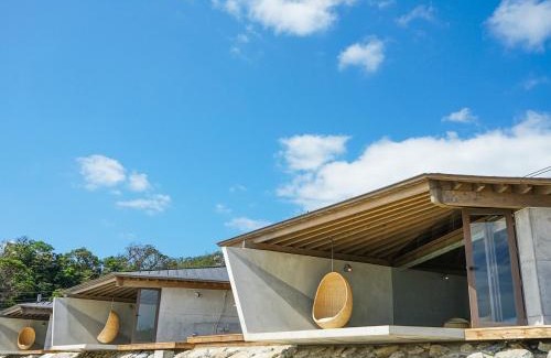 Akagina Villa | Oceanfront Retreat at Denpaku The Beachfront MIJORA
