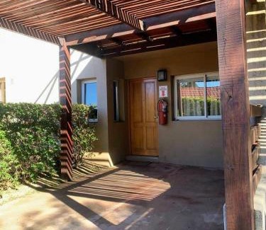 Villa General Belgrano House | Stylish Duplex Apartment with Hot Tub & Family Amenities