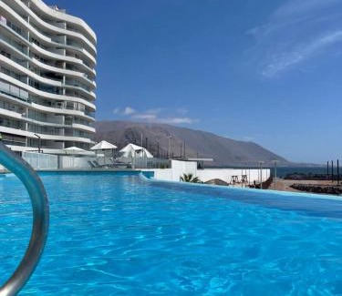 Iquique Apartment | Oceanfront 1D Departamento in Playa Huantajaya, Rated 8.9