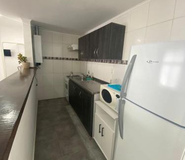 Chajari Apartment | Modern Apartment for 4: Child-Friendly & Guest Rated 10/10