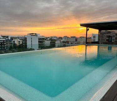 Luis Donaldo Colosio Apartment | Relaxing Stay at Departamento 5th Av - Rooftop Pool & Beach