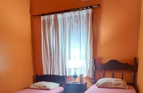 Puerto Iguazu Apartment | Central Apartment Steps from Bus Terminal with Spa Amenities