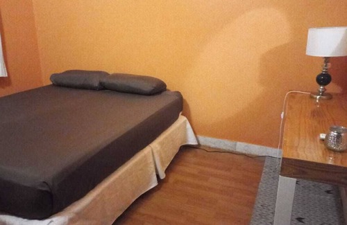 Puerto Iguazu Apartment | Central Apartment Steps from Bus Terminal with Spa Amenities