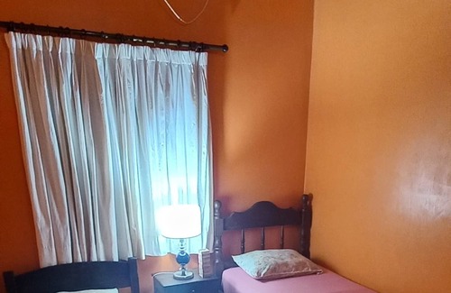 Puerto Iguazu Apartment | Central Apartment Steps from Bus Terminal with Spa Amenities