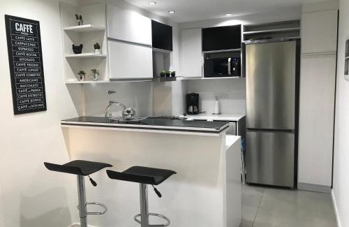 Pinamar Apartment | Exceptional Departamento con Amenities & Family-Friendly Pool