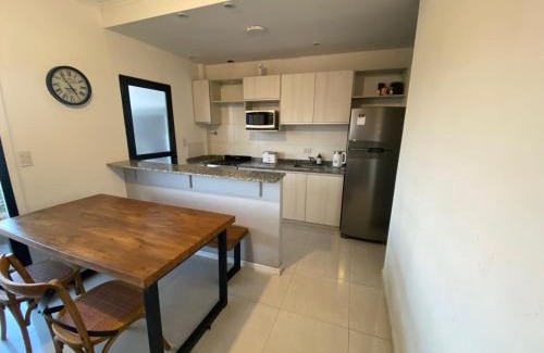 Corrientes Apartment | Inviting Apartment with Balcony and Grill for Families