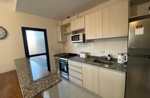 Corrientes Apartment | Inviting Apartment with Balcony and Grill for Families