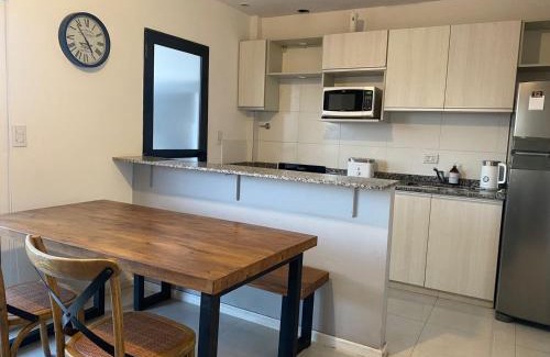 Corrientes Apartment | Inviting Apartment with Balcony and Grill for Families