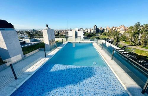 Province of Cordoba Apartment | Delightful Poolside Retreat with Oceanfront Views