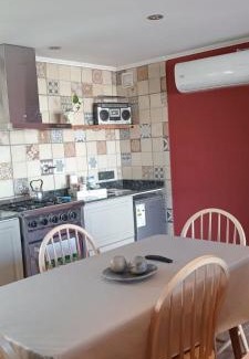 Macachin Apartment | Guest Rated: 9.6 at Departamento Los Sauces with Hot Tub