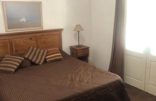 Lujan Apartment | Spacious 1-Bedroom Retreat with Hot Tub & Breakfast