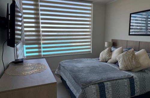 El Tabo Apartment | Inviting Playa Las Cruces LagunaMar: 4-Star Family Retreat