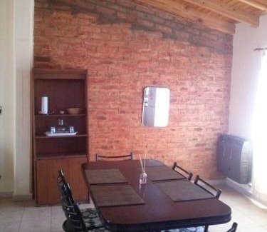Las Grutas House | Comfortable Departamentos Las Grutas with Breakfast & Fireplace