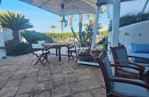 San Felice Circeo Villa | Relaxing Villa Retreat with Sea Views and Green Oasis