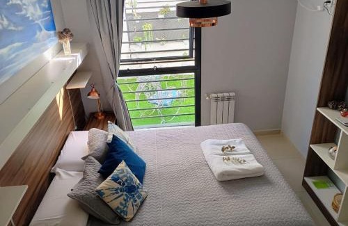 Villa Carlos Paz Apartment | Prime Location with Pool: Guest Rated 10/10 Stay