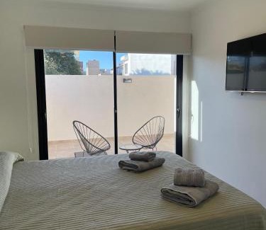Villa Carlos Paz Apartment | Ideal Central Retreat with Pool and Ocean Views