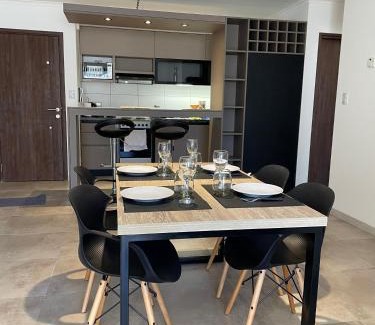 Villa Carlos Paz Apartment | Ideal Central Retreat with Pool and Ocean Views