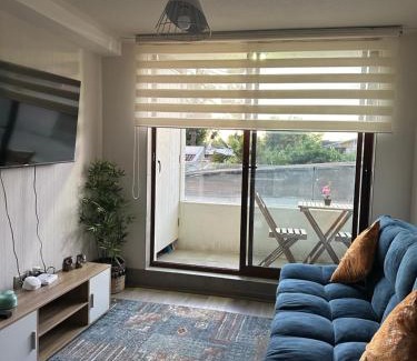 Chillan Apartment | Modern Retreat in Prime Location with Hot Tub Access