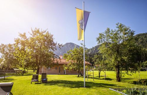 Fischhausen House | Experience Der Anderlbauer am See with Oceanfront Bliss
