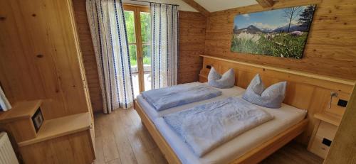 Fischhausen House | Experience Der Anderlbauer am See with Oceanfront Bliss