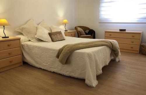 Plaza De La Costera Apartment | Relax by the Beach at Bellreguard - 4-Star Family Haven