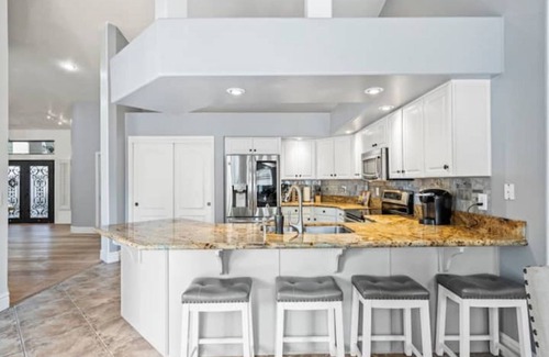 Val Vista Lakes House | Exceptional Desert Oasis with Heated Pool & Stunning Amenities