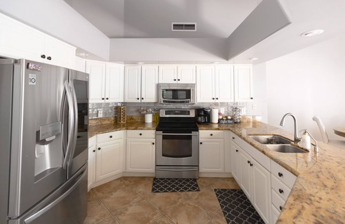 Val Vista Lakes House | Exceptional Desert Oasis with Heated Pool & Stunning Amenities
