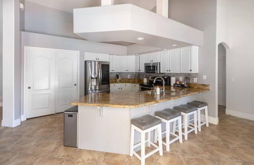 Val Vista Lakes House | Exceptional Desert Oasis with Heated Pool & Stunning Amenities