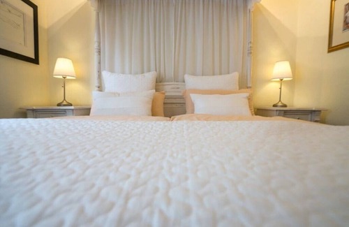 Monschau Apartment | Design apartment 1 with four-poster bed, WLAN, SAT, ground floor.
