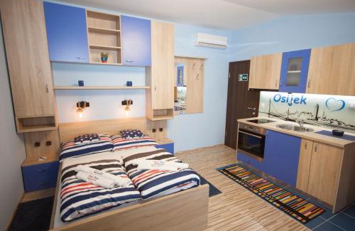 Osijek Apartment | Guest Rated: Design Apartments Red Blue for Families
