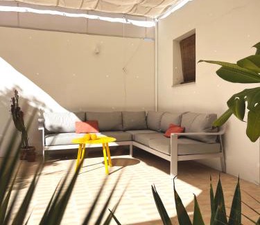 Carrion De Los Cespedes Apartment | Artistic Retreat with Patio & Orange Tree Near Seville