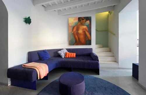 Carrion De Los Cespedes Apartment | Artistic Retreat with Patio & Orange Tree Near Seville