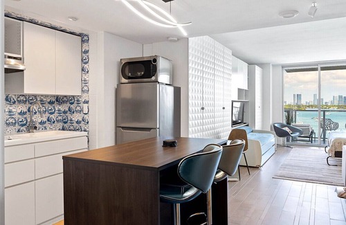 West Avenue Condo | Premier Balcony Studio with Pool, Gym & Spa Access