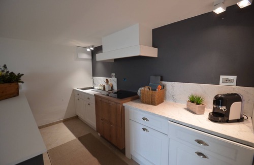 Monade Santa Lucia Apartment | Stylish Apartment with Private Pool and Garden Oasis View