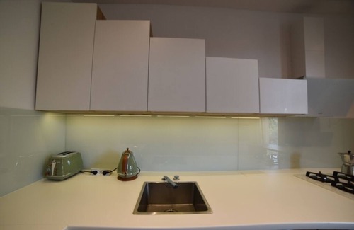 City Centre Apartment | Stylish Designer Apartment with Balcony & Smart TV