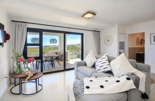 Big Bay Apartment | Modern Beachfront Apartment in Big Bay with Pool Access