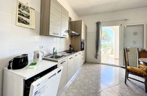 Torre Vado Ski Chalet | Coastal Retreat with Pool and Beach Access for Families