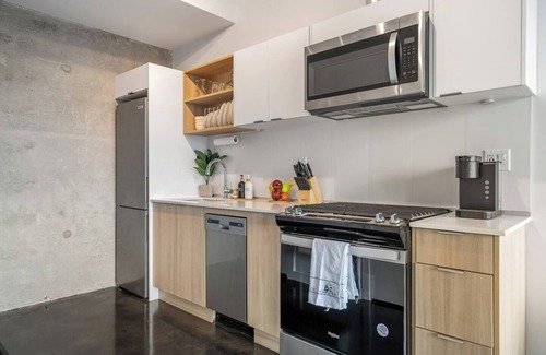 Connaught Apartment | Modern Studio in the Sky with Patio and City Views
