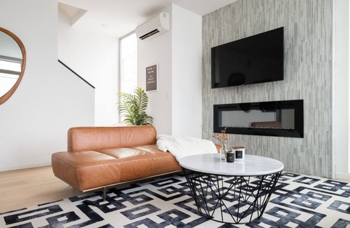 Atlantic House | Urban Designer Retreat with Rooftop Deck & Fireplace